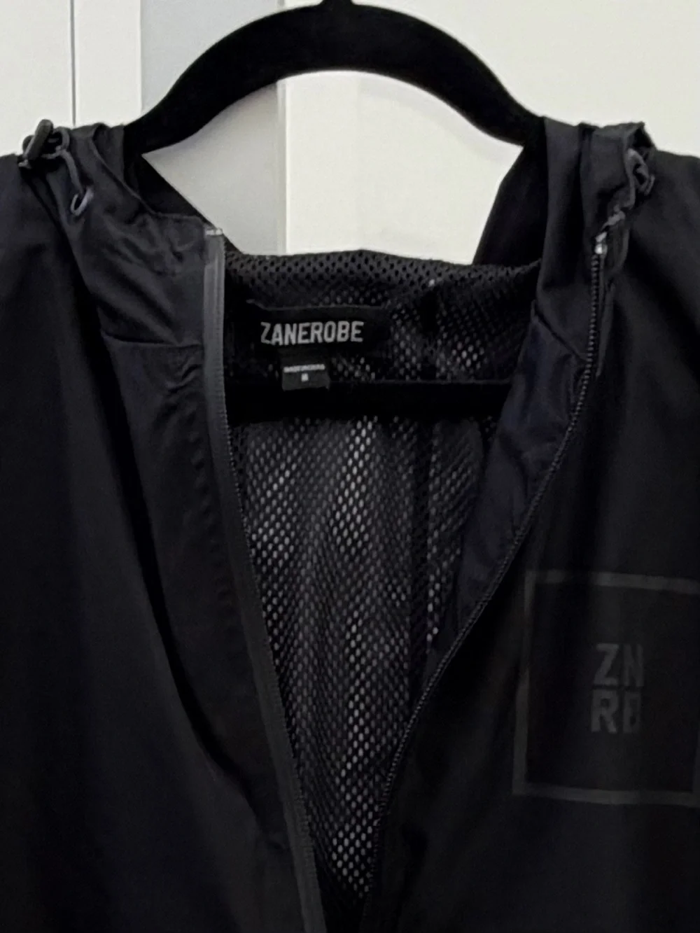 Zanerobe Men's Black 1/4 zip Lightweight Hooded Windbreaker -